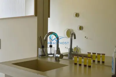 a kitchen counter top with a sink and a sink at Cozy Design Flat - Trastevere in Rome