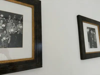 two framed photographs hanging on a wall at DOLCE VITA VIMINALE ROOM in Rome