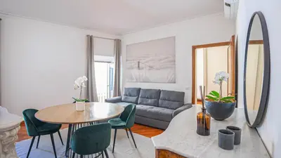 a living room with a table and a couch at EasyTopStay - Piazza Navona Elegant Apartment in Rome