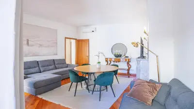 a living room with a couch and a table at EasyTopStay - Piazza Navona Elegant Apartment in Rome