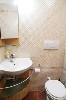 a shower with a glass door in a bathroom at Villa Bonelli Loft in Rome