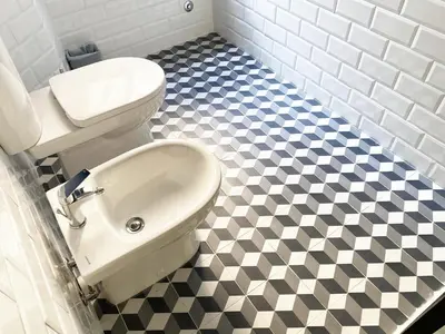 a bathroom with a toilet and a sink at Appartamento a due passi da San Pietro, Vaticano in Rome