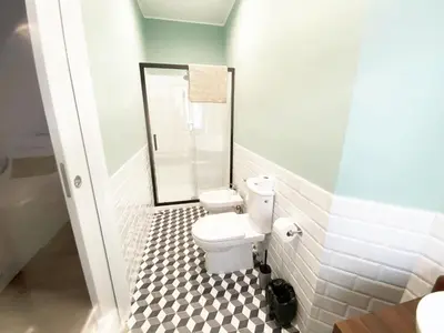 a bathroom with a toilet and a glass shower at Appartamento a due passi da San Pietro, Vaticano in Rome