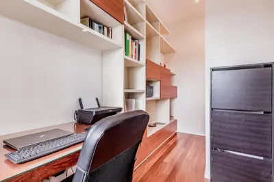 an office with a desk with a laptop and a keyboard at Luxury apartment front of Cavalieri Hilton Hotel in Rome