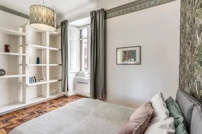 a bedroom with a bed and a window at The Great Green in Rome
