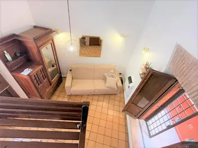 an overhead view of a living room with a couch at Monti Wood Loft in Rome