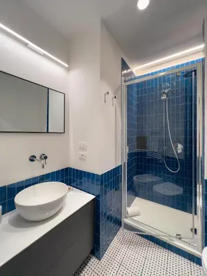 a bathroom with a tub and a sink and a shower at Casa Annamaria al Pantheon in Rome