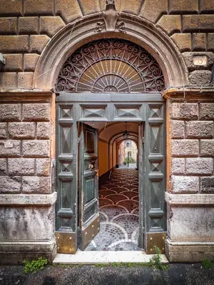 an entrance to a building with an archway at Casa Annamaria al Pantheon in Rome