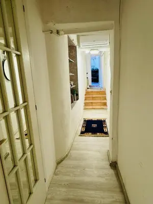 an empty hallway with stairs in a building at La Casa di Cinzia in Rome