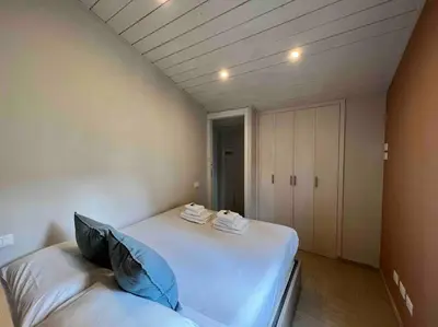 a bedroom with two beds in a room at New! Uptown Terraces in Rome