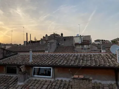 a view of the roofs of a building at New! Uptown Terraces in Rome