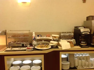 a kitchen with a counter with food on it at Domus Australia in Rome