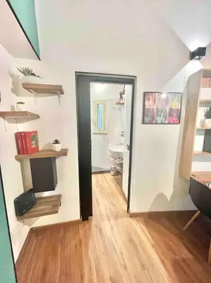 a room with a bathroom with a toilet and a hallway at NEW Look8 Vatican Home in Rome
