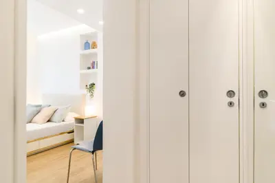 a bedroom with a bed and a desk and a chair at Modern & Elegant by NDP rent in Rome