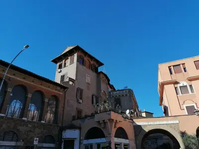 a building with a clock tower on top of it at Claudia B&B in Rome