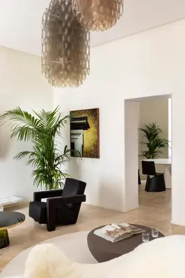 a living room with a couch and a table at Le Case di Andrea - Luxe Rome apartment in Rome