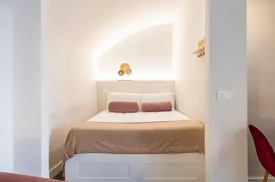 a bathroom with a sink and a mirror and a toilet at Relax Campo de' Fiori in Rome