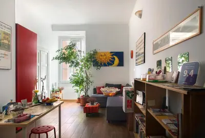 a living room with a couch and a table at Ulysses in Rome in Rome