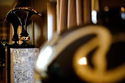 a candle holder in a room with a lamp at Penthouse Suite Rome - Private Suites in Rome