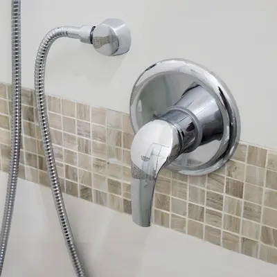 a shower head on a wall in a bathroom at PeoniaMaximaHouse -Piazza Bologna- in Rome