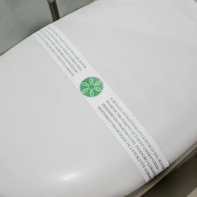 a book with a green label on it at PeoniaMaximaHouse -Piazza Bologna- in Rome