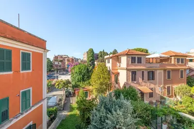a view of a city street with houses at Fantastic Penthouse over the Roman Sky in Rome