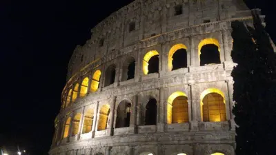 a building that is lit up at night at Gladiator's House in Rome