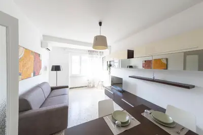 a living room with a couch and a table at [Centro Storico-5min Vaticano] Domus in Rome