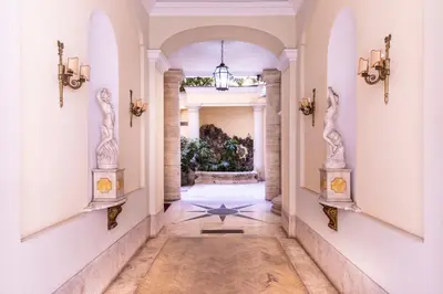 a hallway of a home with an archway at Casa Salandra by Hili in Rome