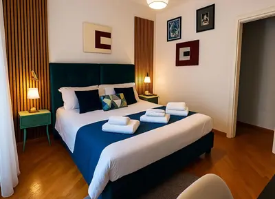 a living room with a couch and a table at VATICAN GLAMOROUS at Passeggiata del gelsomino - FREE Parking, 4 Guests, Central Rome in Rome