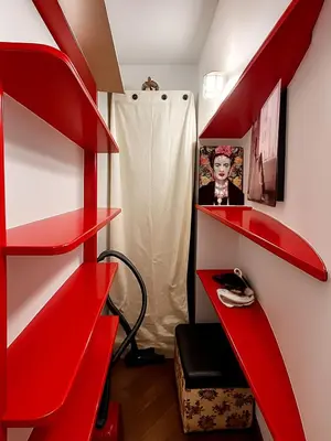 a bathroom with a white toilet and a checkered floor at VATICAN GLAMOROUS at Passeggiata del gelsomino - FREE Parking, 4 Guests, Central Rome in Rome