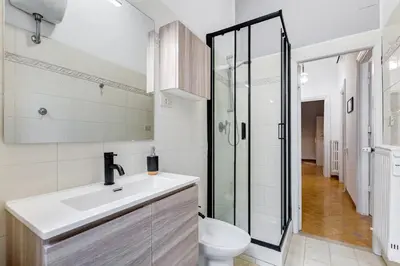 a bathroom with a sink and a toilet and a shower at Colors & Culture near Colosseum in Rome