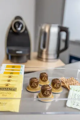 a group of chocolate muffins on a counter at Luxury Trastevere gym & rooftop 5H in Rome
