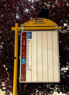 a calendar sign on two yellow poles at Trastevere Gianicolense casa con giardino in Rome