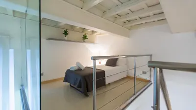 a small bedroom with a bed in a room at Rental in Rome Purificazione apartament in Rome