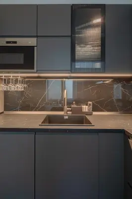 a kitchen with a sink and a microwave at Gianicolense 22 in Rome