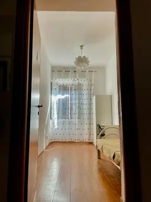 a bedroom with a bed and a window in it at h135 in Rome