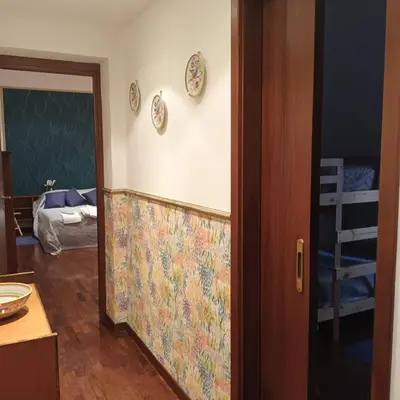 an open door to a room with a bedroom at La Casa di Filippo in Rome