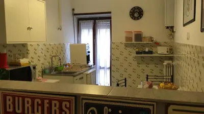 a kitchen with a counter top in a room at Residenza Flaminia in Rome