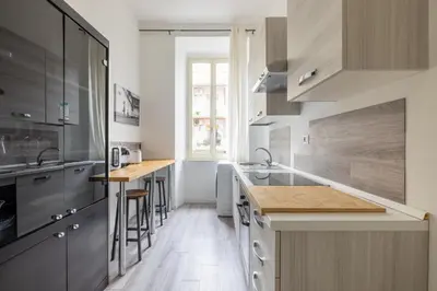 a kitchen with a sink and a counter top at Vatican Stylish by Varental - Guardabassi Collection in Rome