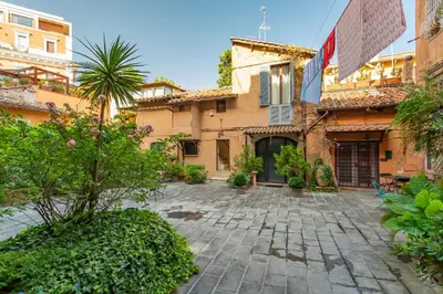 a courtyard in front of a building at Al cortile del Moro in Rome