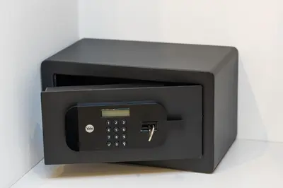 a black safe with a key in it at La Dolce Vita Boutique Guest House in Rome