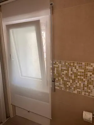 a shower door with a window in a bathroom at PARIOLI LUXURY SUITe II in Rome