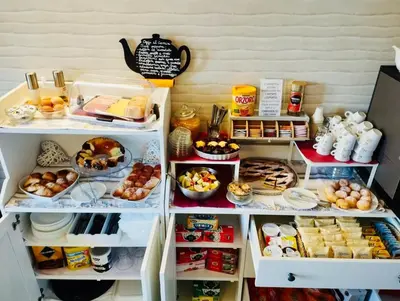 a refrigerator filled with lots of different types of food at Gemini Suite in Rome