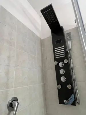 a shower with a black control panel in a bathroom at Bpremium apartment in Rome