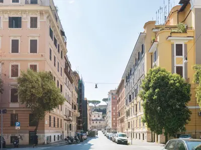 a street in a city with buildings and trees at Apartment Pratolina by Interhome in Rome