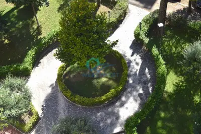 an overhead view of a garden with a fountain at Oasis of Ample Space and Comfort in Rome