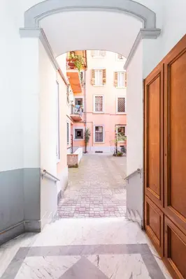 an empty alley with a door in a building at Casa Miso in Rome