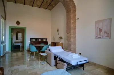 a hospital room with a bed and a table at Fororomano Luxury in Rome