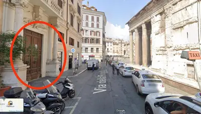 a red circle on a city street with cars at Welcome to Pantheon in Rome